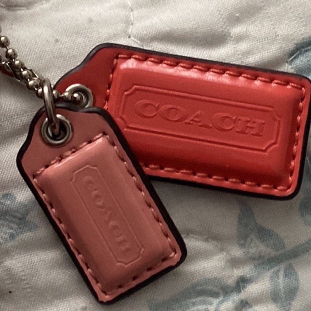 Coach cross body purse. Coral and Briwn